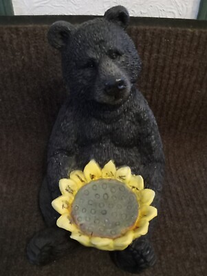 Alpine Black Bear Sitting with Sunflower Birdfeeder $60.00