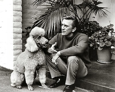 Kirk Douglas and a pet poodle sitting on a step 8x10 Photo Reprint $9.95